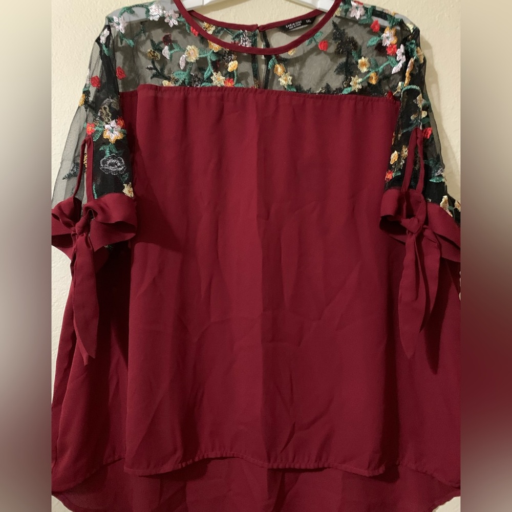Maroon sheen top will be steamed before shipping.